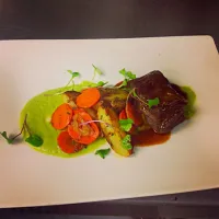 braised beef, roasted fingerling potatoes,  sugar snap pea puree, glazed carrots