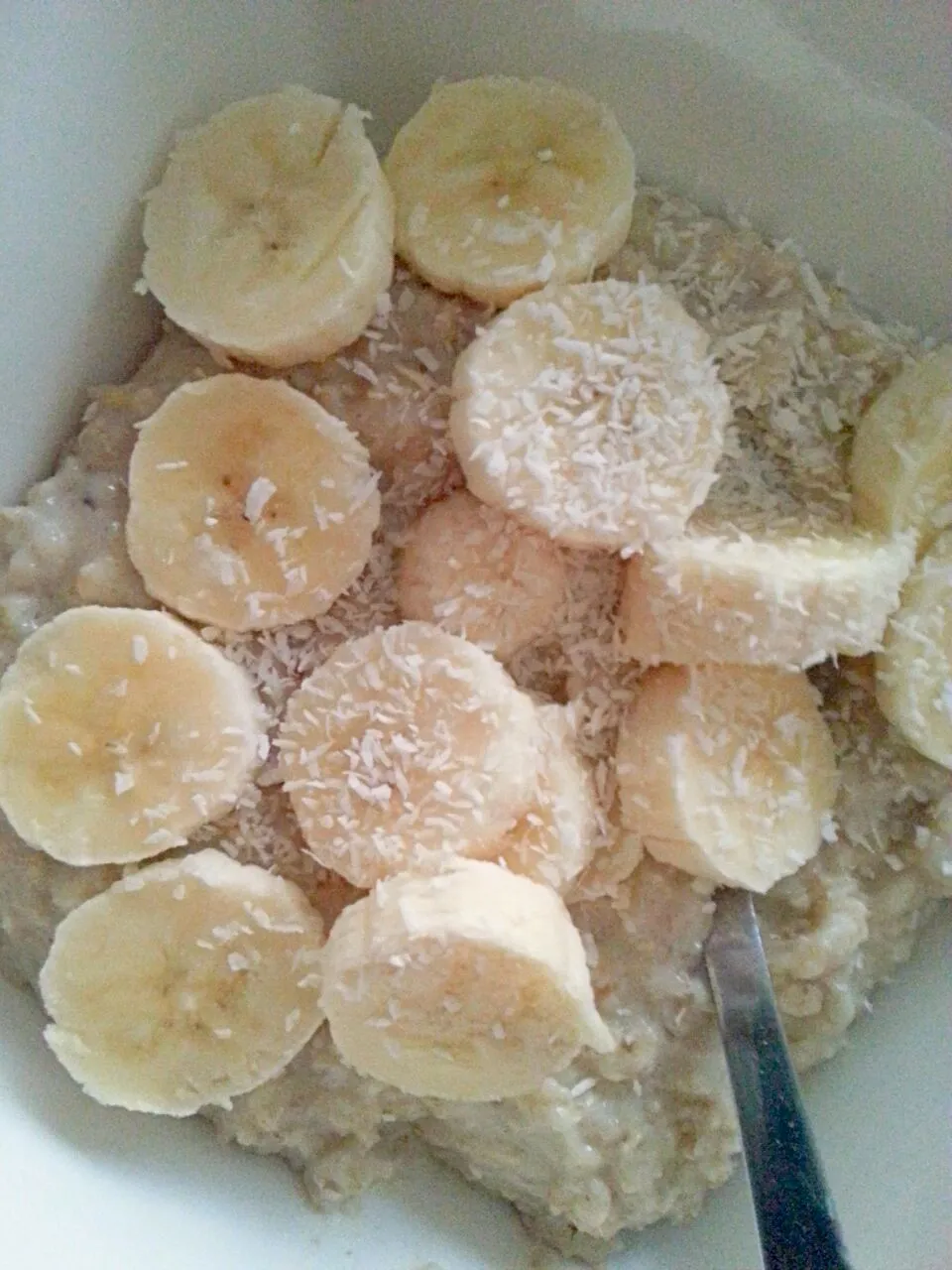 oatmeal with banana and coconut crisps|tanyaさん