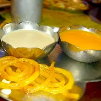 Snapdishの料理写真:its a Indian sweet dish... love to have aam ras,  rabdi and jalebi.. yummy :)|monicaさん