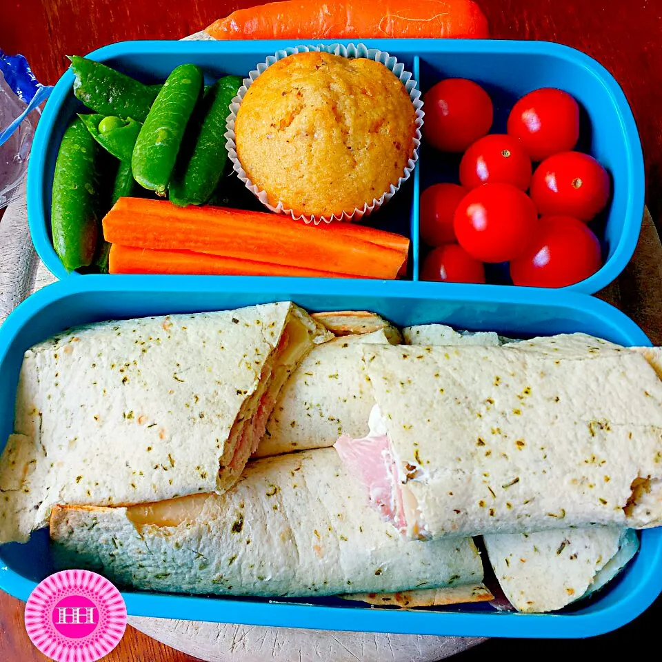 Snapdishの料理写真:Bento Lunch for my husband. 9th June 2014 #garlic wrap #banana muffin #sugar peas #carrotts # cherry tomatoes|Biscuite Queenさん