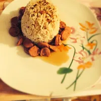 Snapdishの料理写真:Riz en forteresse et son fleuve de saucisses|Jakalinaさん