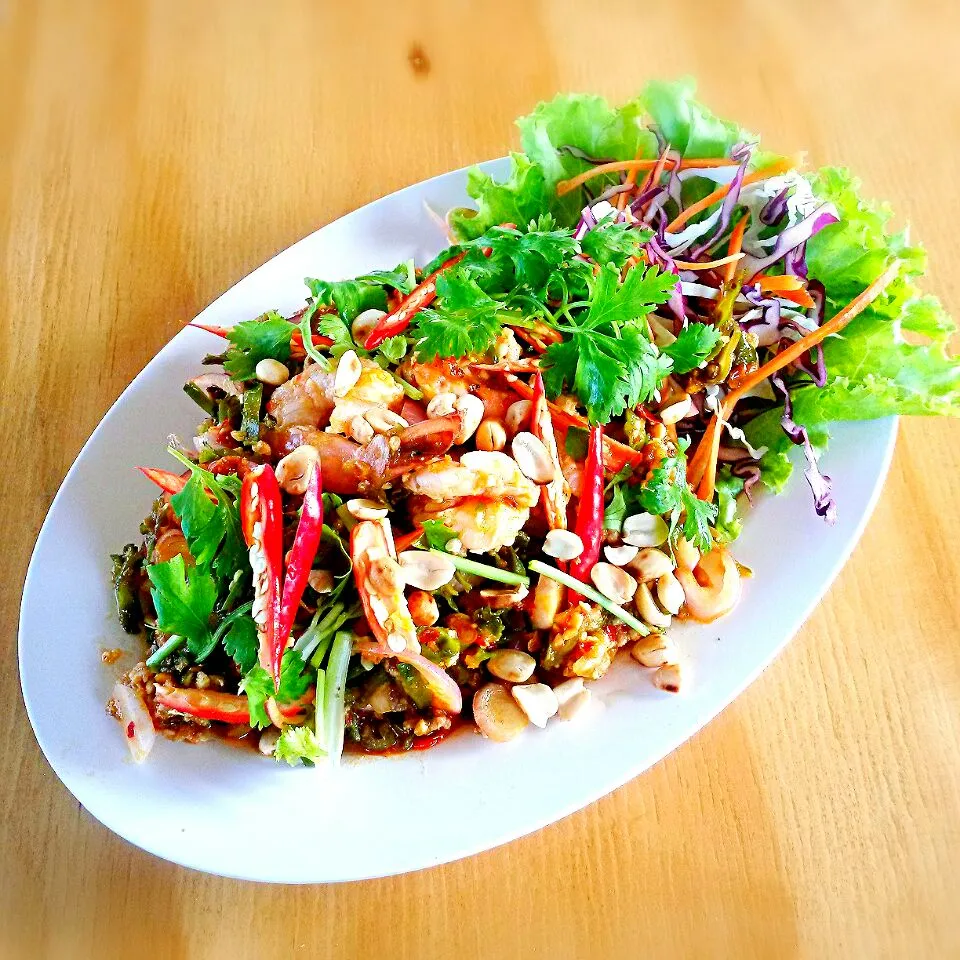 Shimp spicy salad mix with winged bean.
(ยำถั่วพูกุ้งสด)|Sittichai Cantongさん