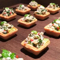 Mini tart filled with crab meat