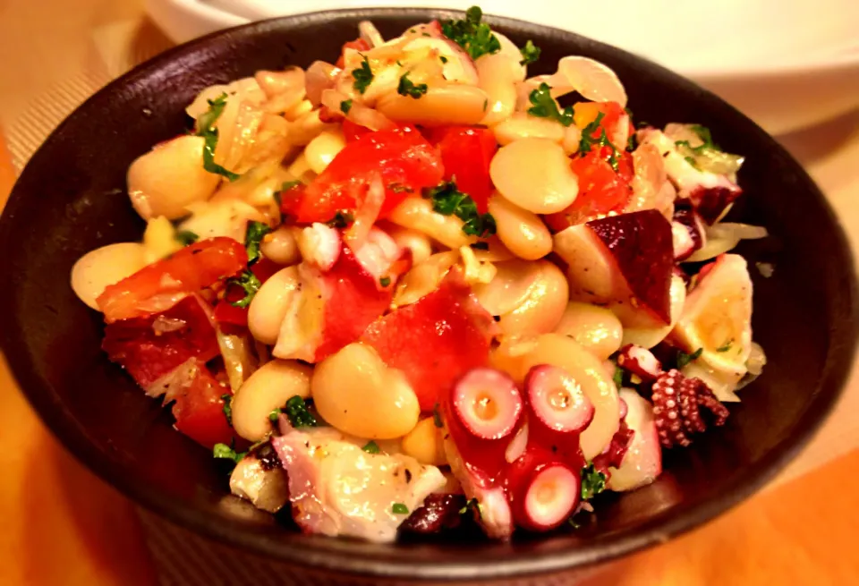 White bean and octopus salad with a drizzle of blood orange infused olive oil|Kirk Awiamさん