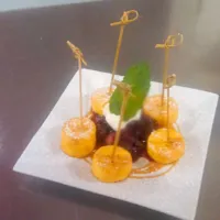 plantain lollipops with fresh berry compote rum caramel and butterscotch whipcream|jacobさん