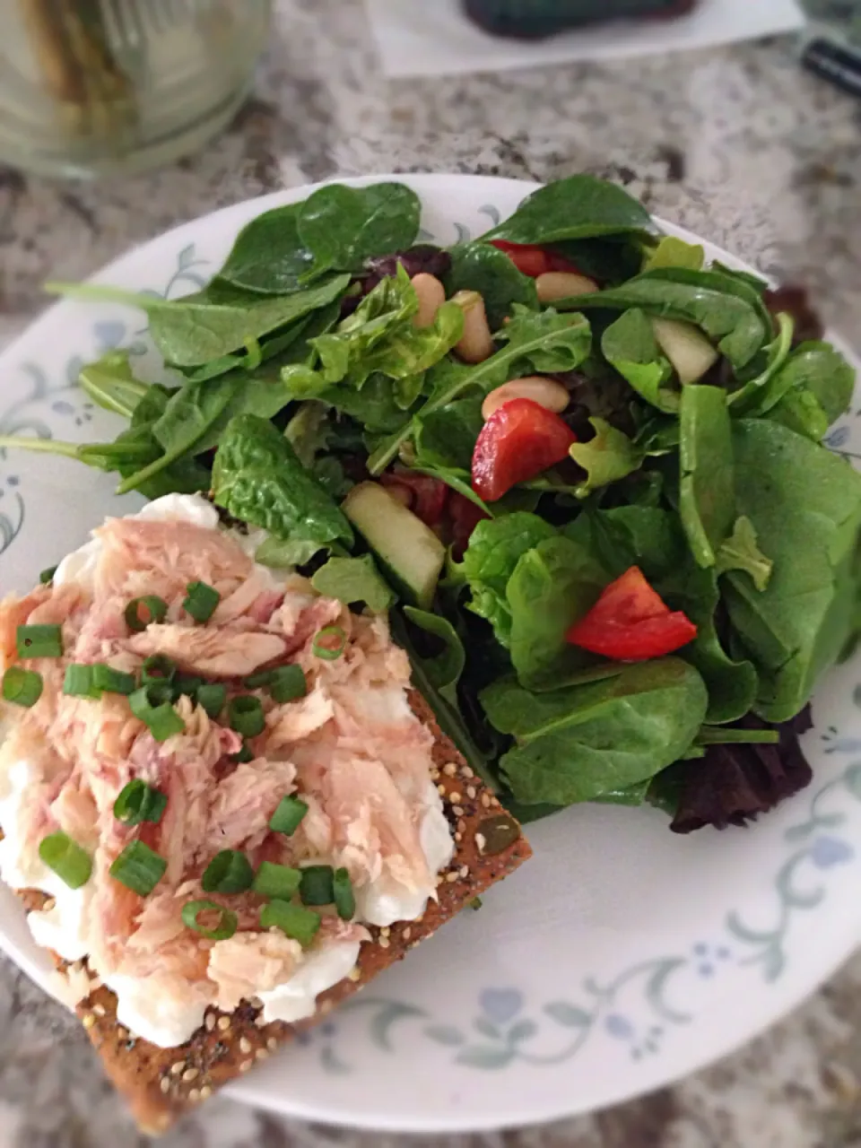 Mixed greens with white beans, tomatoes and cucumbers with a crispbread topped with cottage cheese and smoked trout|Martha P.さん