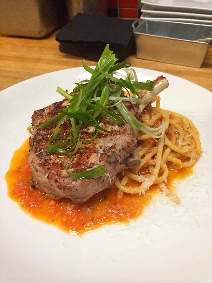 Snapdishの料理写真:Dry aged Duroc pork chop pasta all'amatriciana with guanciale|jason mcconnellさん