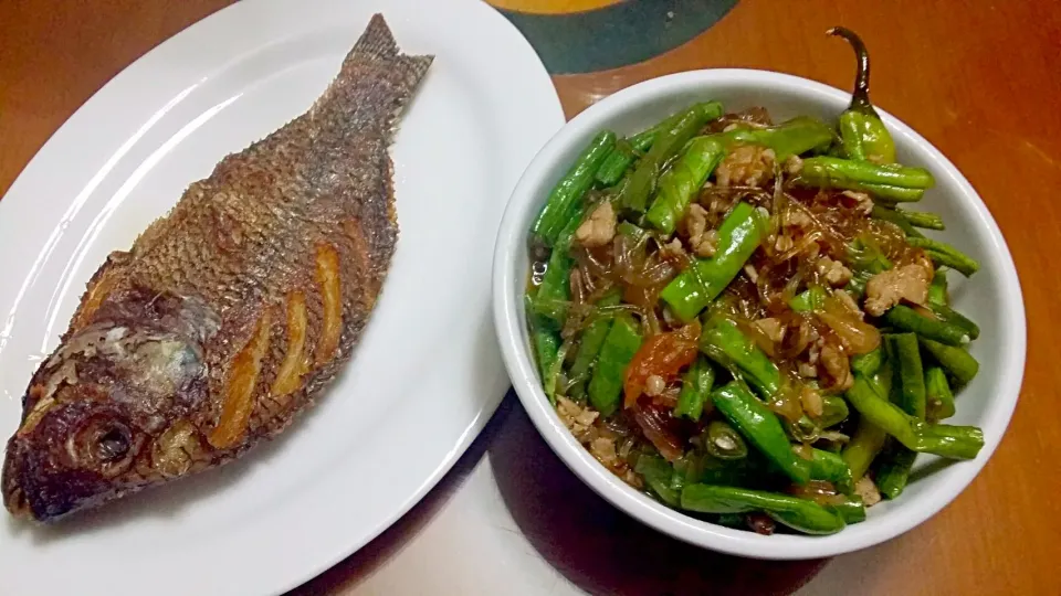 Snapdishの料理写真:Crispy Fried Tilapia and Sauted Beans with ground chicken and Sotanghon|Irene Lee Del Rosarioさん