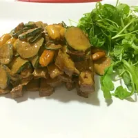 Snapdishの料理写真:Sliced seitan with toasted almonds and zucchini in a soy sauce cream|Angela Brunoさん