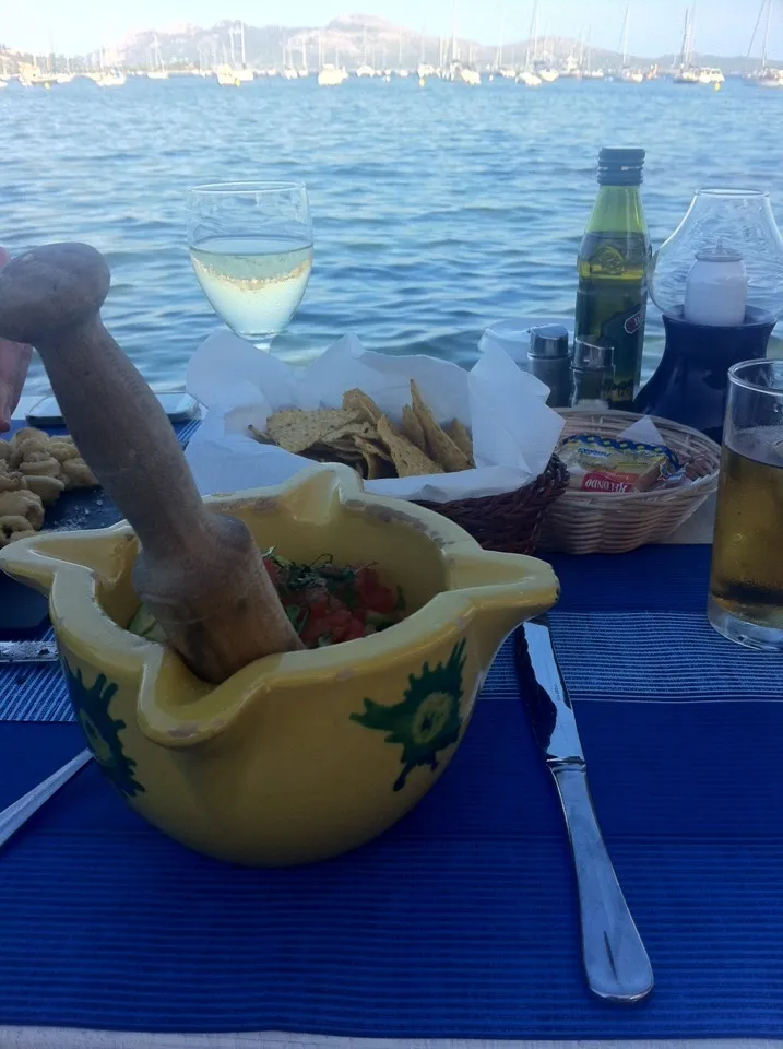 Snapdishの料理写真:Nachos and guacamole on the marina in puerto pollensa, Majorca!  On vacation!|🍓Jolejo🍓さん