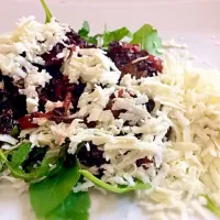 Black rice with tomatoes in pieces and ''Cacioricotta'' cheese|Angela Brunoさん