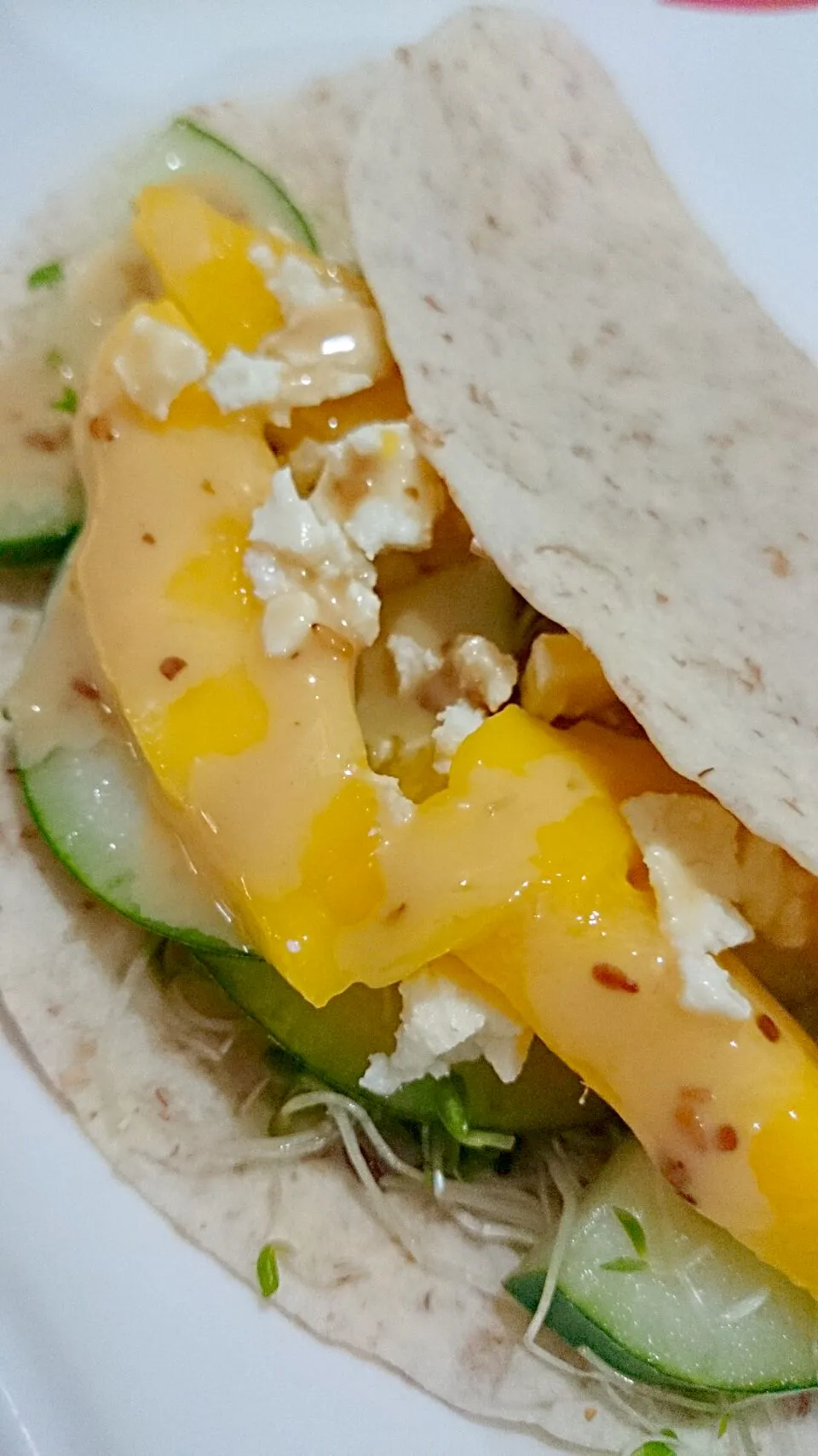 Pita bread with cucumber,mango,alfalfa and feta cheese|bonnieさん