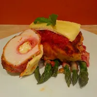 Snapdishの料理写真:Crumbed Chicken Breast stuffed with Ham, Brie & Roast Pepper Pesto w Grilled Asparagus Wrapped in Prosciutto|Ben Brillさん