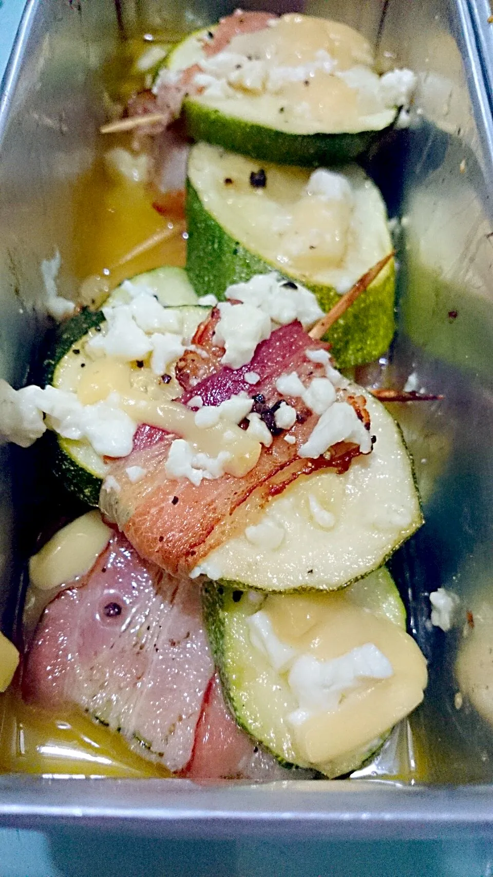 Zucchini bacon roll with feta cheese..|bonnieさん