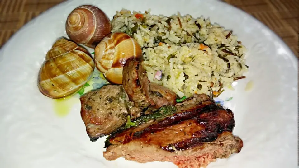 escargot with lamb shank and fennel spinach wild rice.|Jiraphon Gさん