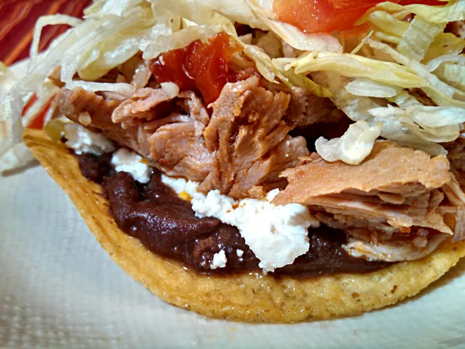 Spicy pork tostadas with black beans and queso fresco|Sashi Steinerさん