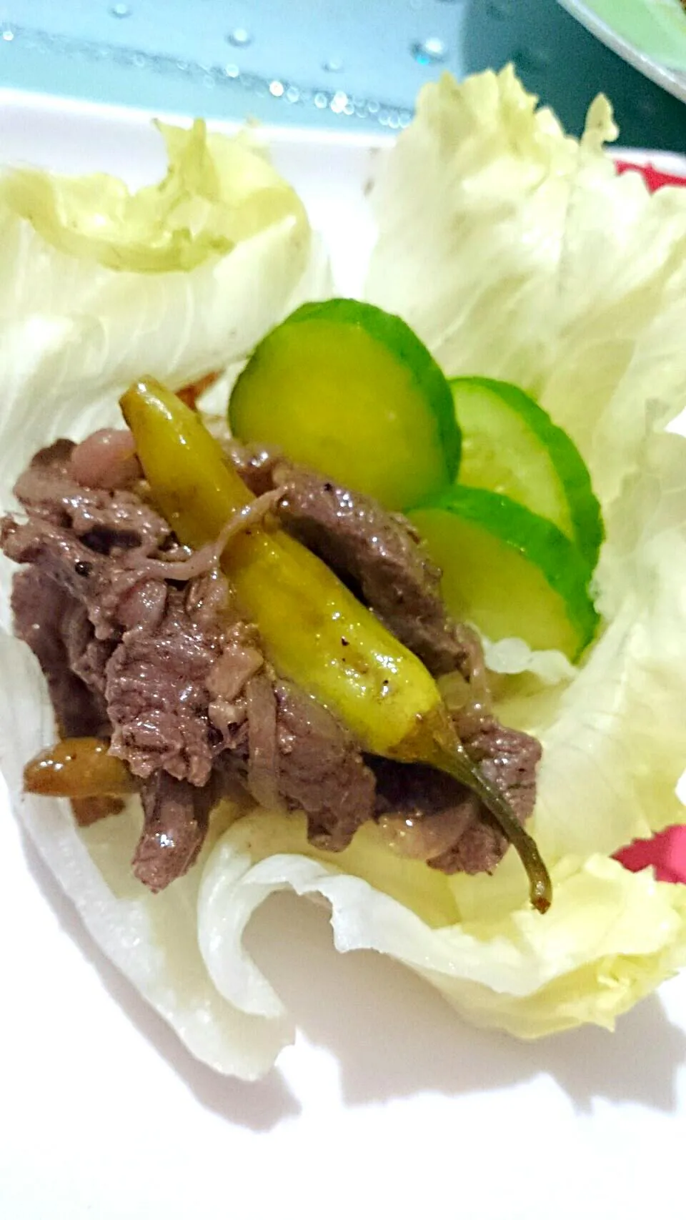 Stir fry Venison meat in onion,ginger and green chilli wrap with fresh green letuce...|bonnieさん