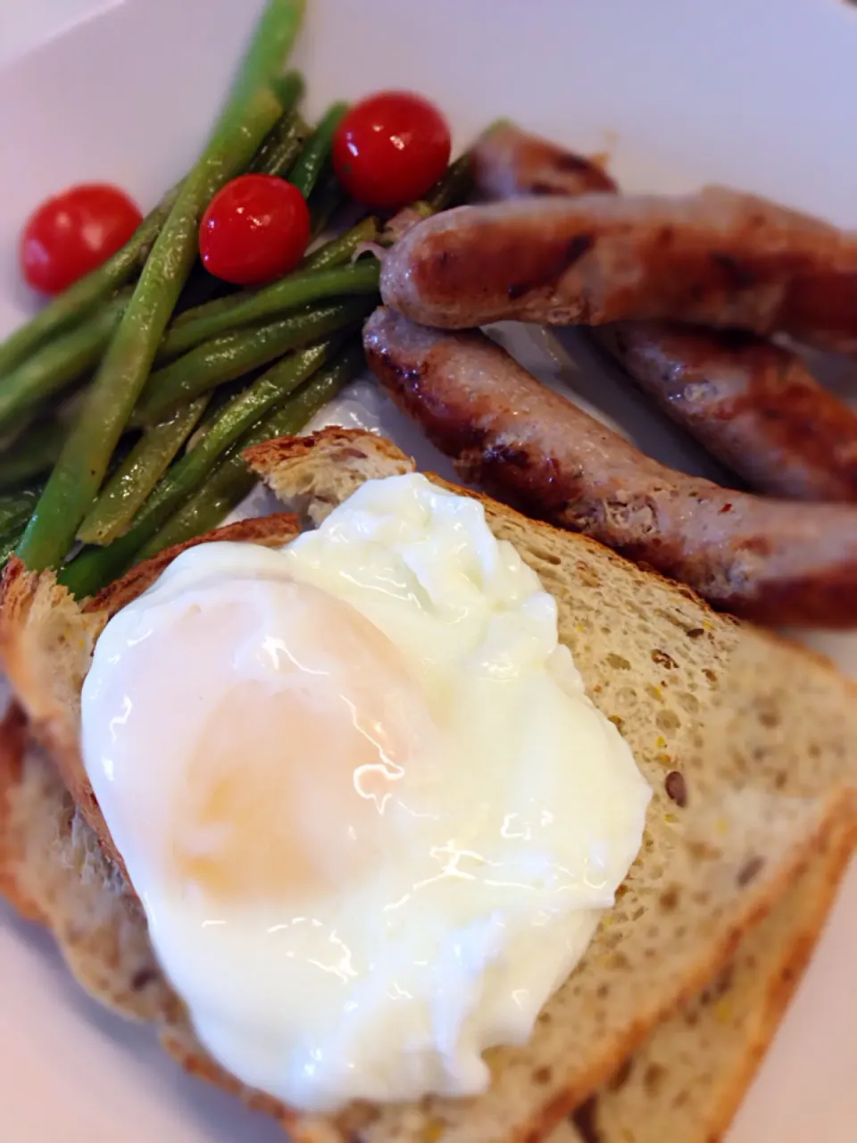 Poached egg with sausage|karen limさん