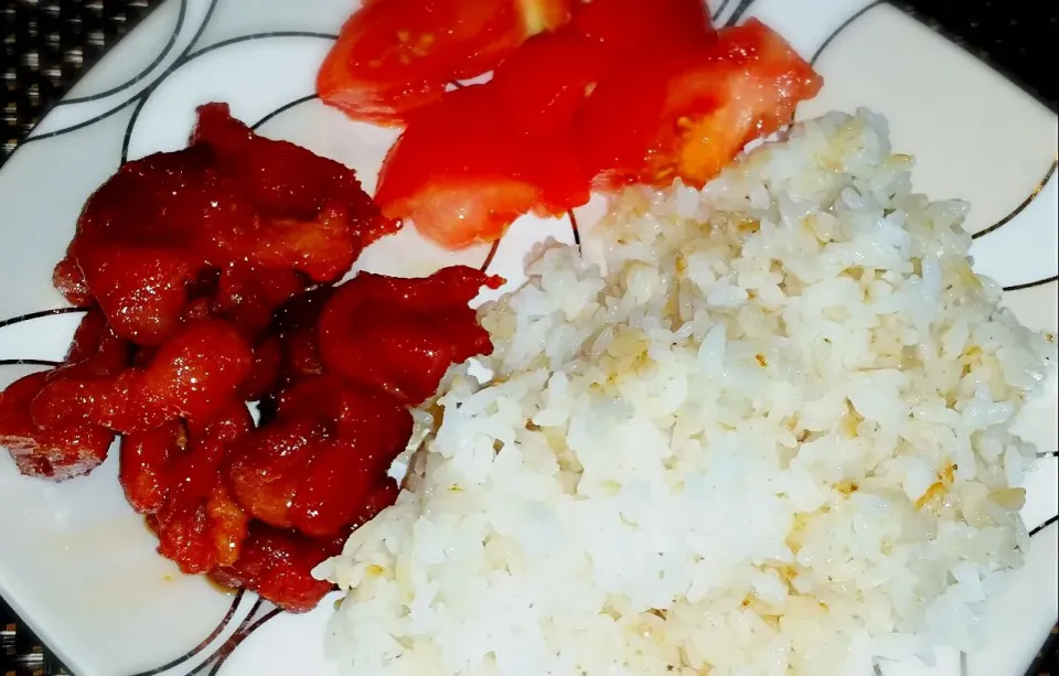 Snapdishの料理写真:Pork Tocino, fried rice and salted tomatoes..|Ayel Santellaさん