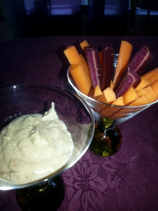 orange and purple carrots with roasted eggplant hummus.|Polly Gelfusoさん