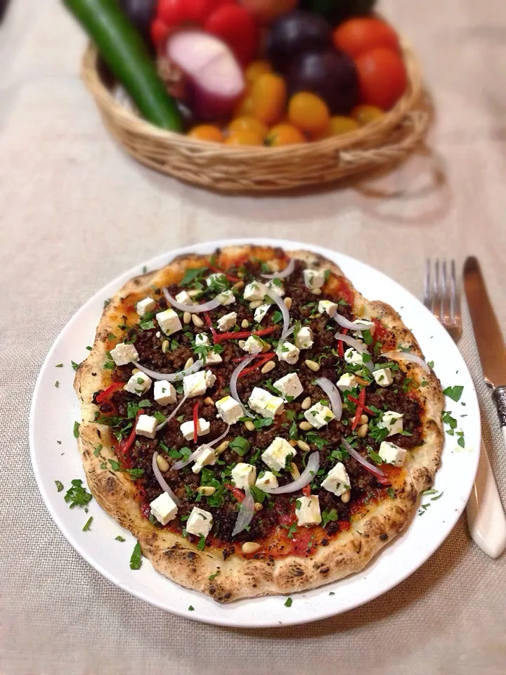 Lamb pizza with feta cheese and pine nuts|rick chanさん