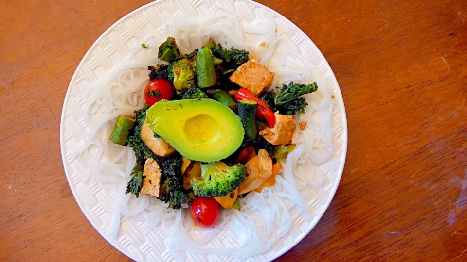 tofu, kale , avocado, grape tomatoes, broccoli, baby peppers, brussel sprouts on a bed of rice noodles.  got my rainbow veggies today!|arti gさん