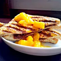 Snapdishの料理写真:Nutella French toast topped with mango sauce