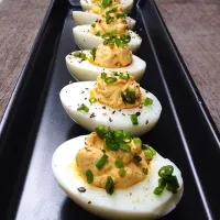 Snapdishの料理写真:Bacon & Cheddar Deviled Eggs|OnTheWoodenTableさん