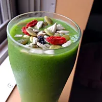 Green smoothie with nuts and dried fruits