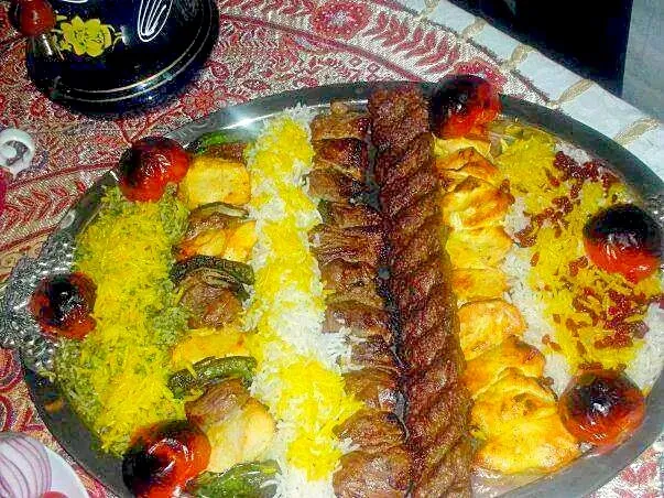 Snapdishの料理写真:Beef and chicken kabab with rice and grilled tomato and onion|Ghazal Shakibさん