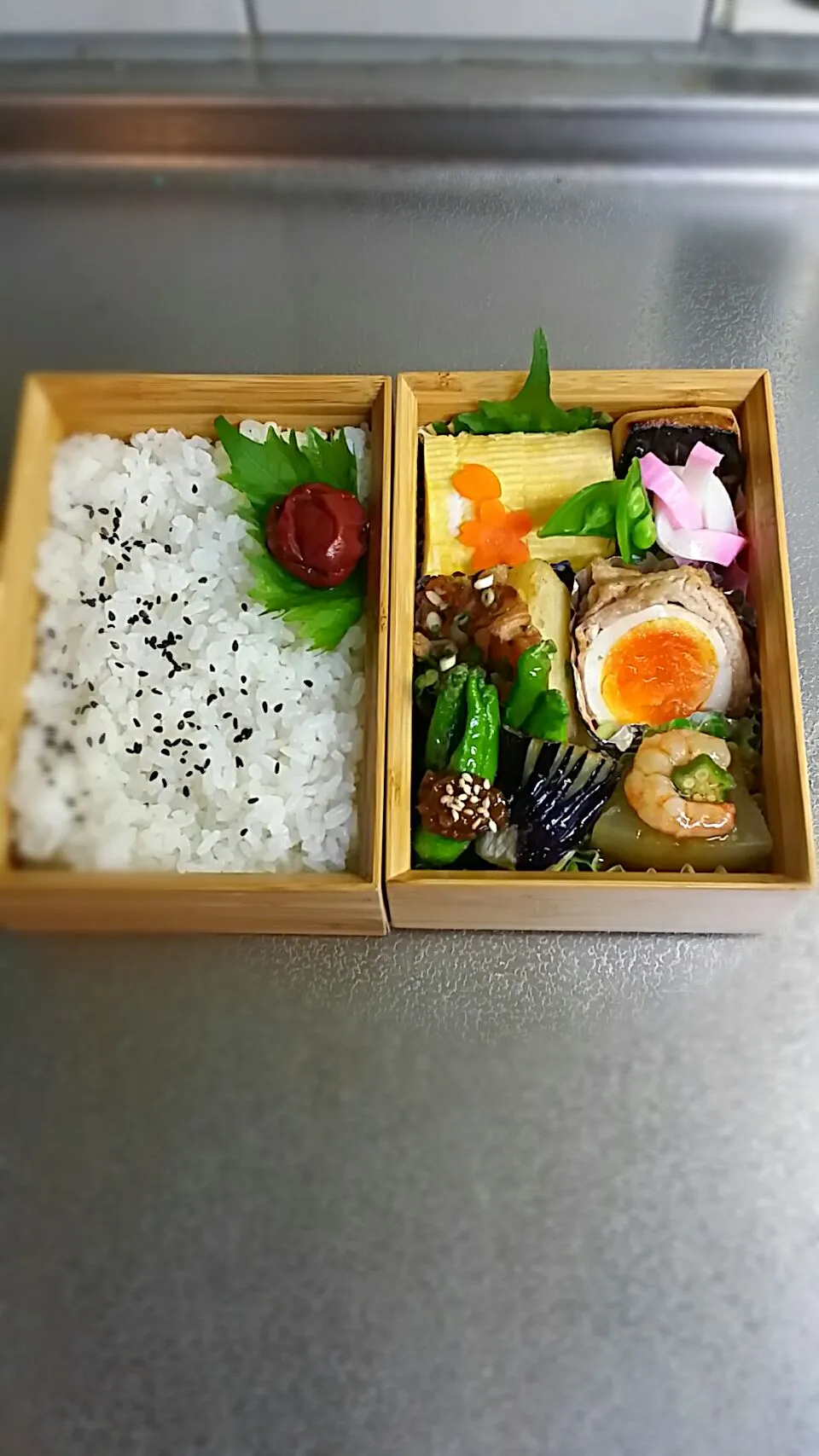 《火曜日のお弁当》🍱

・だし巻き玉子
・じゃが芋ガーリックタップリソティ～
・肉巻玉子
・冬瓜の餡かけえび添え
・茄子の素揚げ
・ししとう甘味噌
・焼鯖

行ってらっしゃ〜い♡|藤田 まり子さん