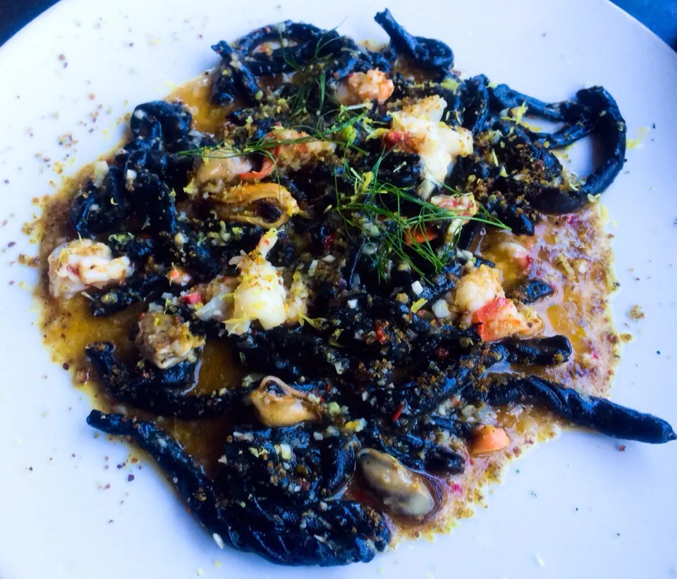 Snapdishの料理写真:Strozzapreti Nero di Seppia from Bestia (squid ink, mussels, and clams)|sooprcoolchicaさん