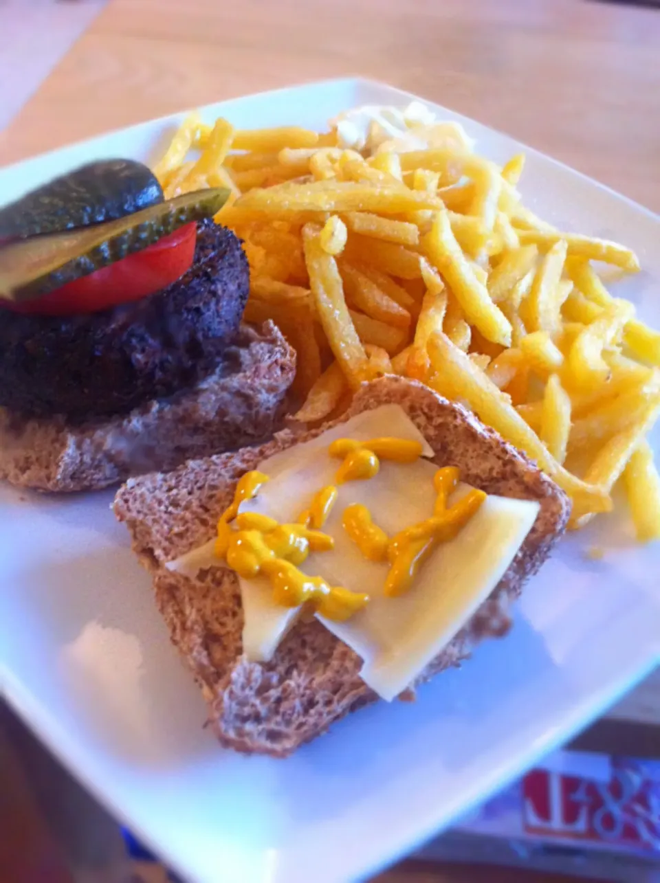 Veggie burger topped with mustard, tomato dill pickles and cheese with fries on the side|🍓Jolejo🍓さん