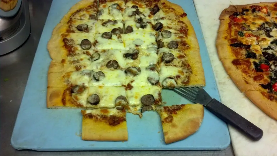 italian sausage, yellow bells and carmelized onion|Roberto Cruzさん