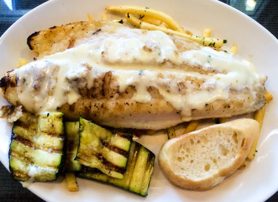 Snapdishの料理写真:Swai (White Fish) with Grilled Zucchini and French Fries from California Fish Grill|sooprcoolchicaさん