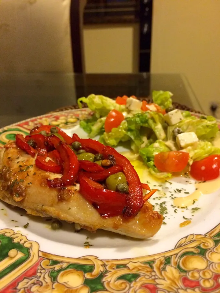 Snapdishの料理写真:Marinated chicken stuffed with capsicum, capers, olives & a side of caesar salad|Ismahan Khanさん