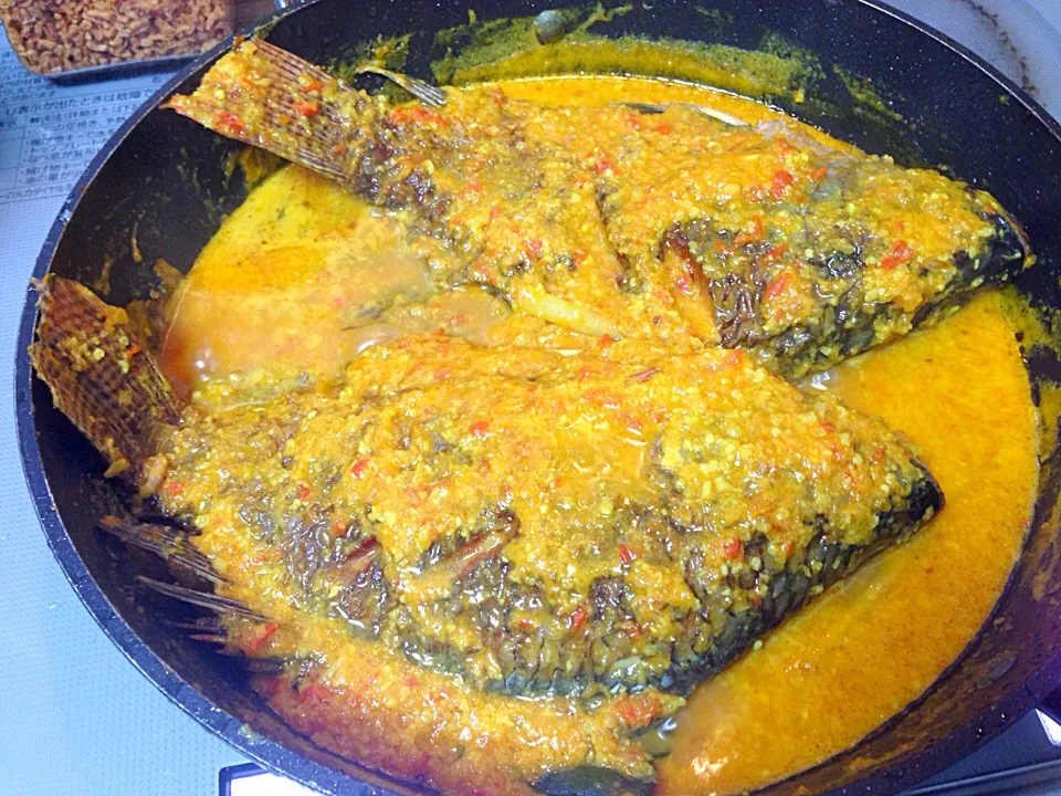 Snapdishの料理写真:Acar bumbu kuning tilapia|yeni kartikasariさん