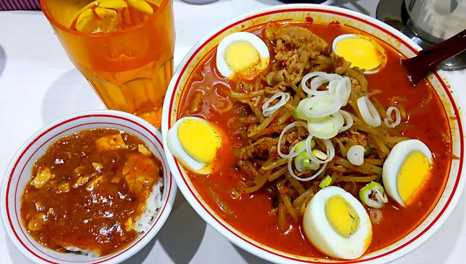 蒙古タンメン中本 東池袋店
味噌卵麺 880円 + プチ麻婆丼 120円 + サービス烏龍茶|しんたたさん