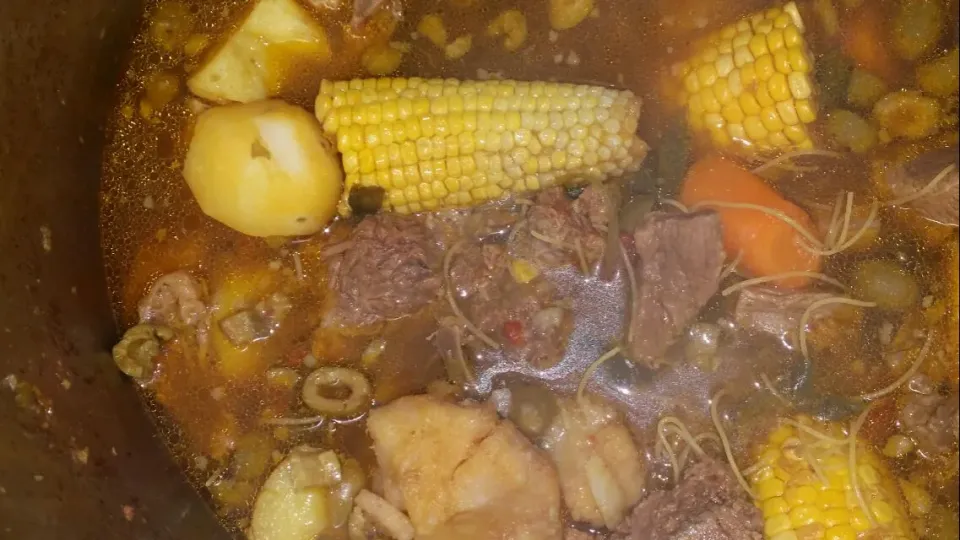 Beef neck bone with root vegetables corn and fine noodles Puertorican style Gumbo.  In Puerto Rico this dish is named  "SANCOCHO". THE BEEF NECK BONE ARE SLOWLY|Frank Ortizさん