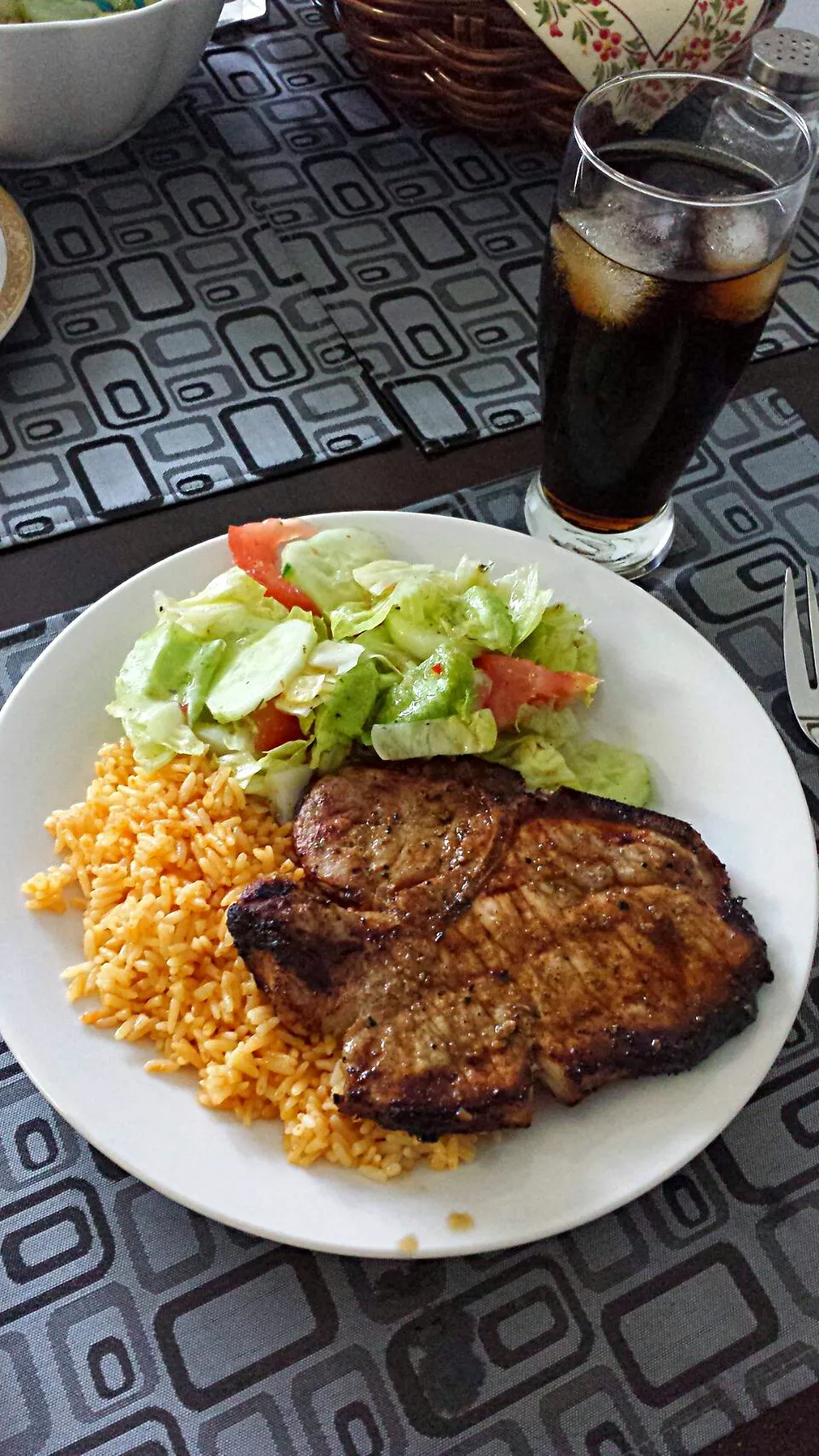 pork chop and Spanish rice and salad|Nicole Nascimentoさん