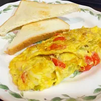 Snapdishの料理写真:Vegetable and cheese Omelette and Toast|Lob Reaultboudさん