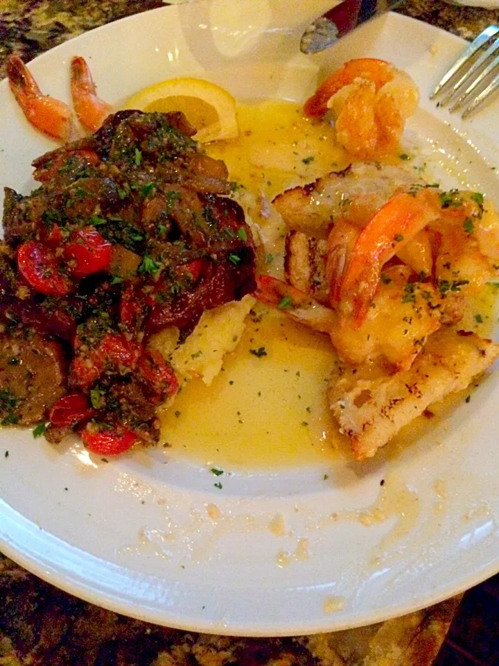 Snapdishの料理写真:Top sirloin and shrimp scampi  topped with tomato mushroom garlic parsley|Moe Arianejadさん