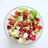 Waldorf salad with pomegranate, raspberry and honey yoghurt dressing