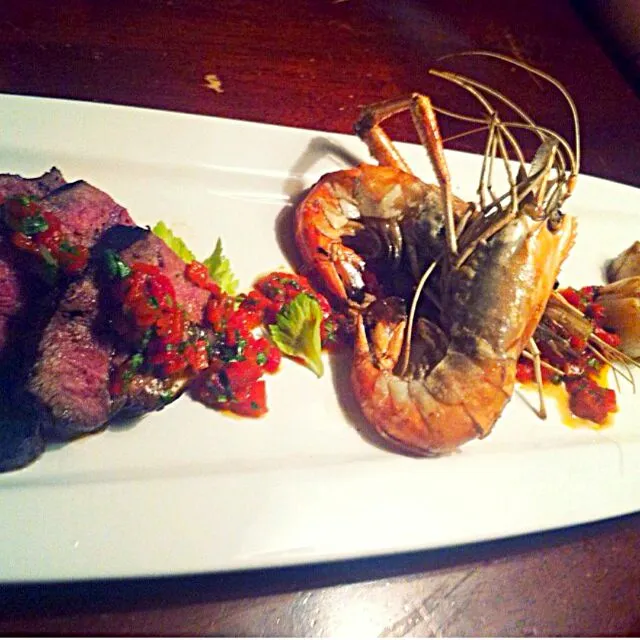 Snapdishの料理写真:Prawn, Rare Filet, Tomato confit relish|Jenn Strangeさん