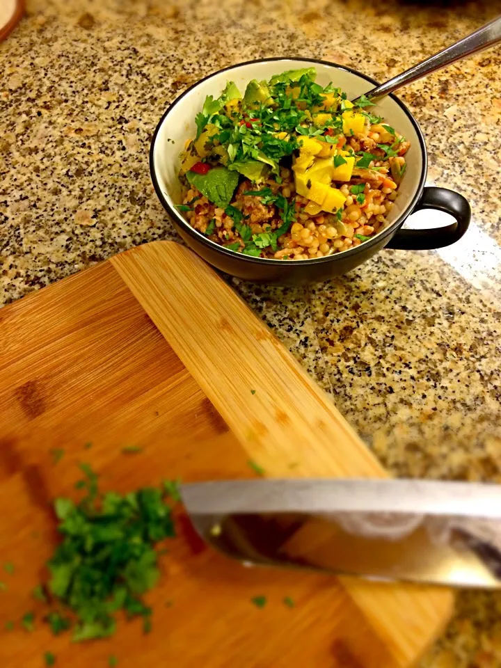 Quinoa, ground turkey, and salsa with avocado and mango salsa topped with cilantro|Jae L. Hansenさん