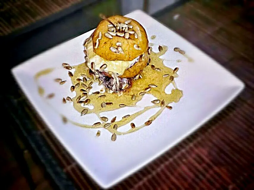 baked apple stuffed with cherries and ice cream, covered with honey and roasted sunflower seeds..|Matthew NLさん