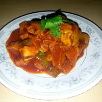 Pork cubes with peppers in a spicy red sauce|Tashawnda Ramirezさん