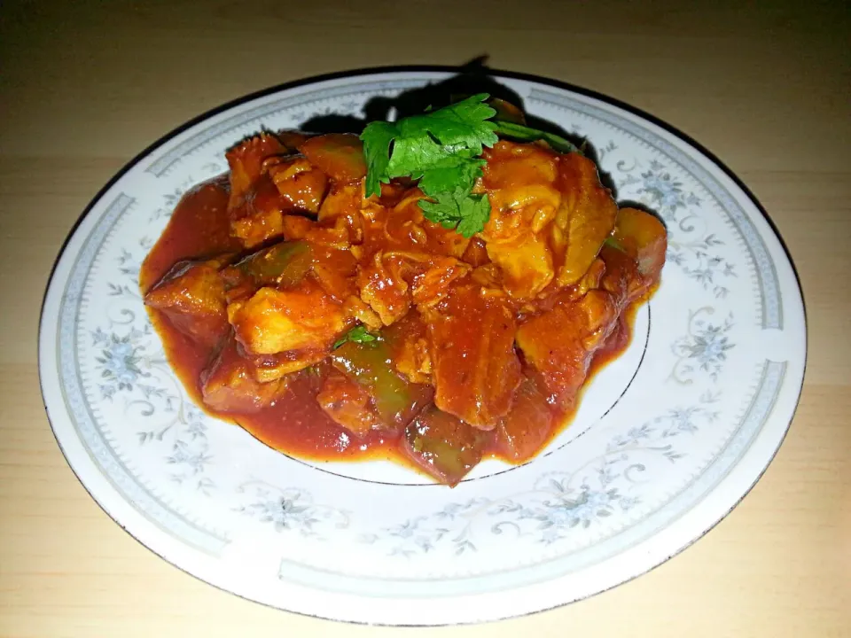 Pork cubes with peppers in a spicy red sauce|Tashawnda Ramirezさん