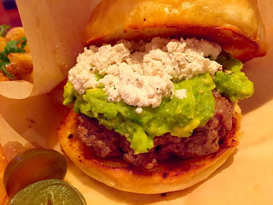 Snapdishの料理写真:Mexican Burger with house made Queso & Guacamole|Chris Shannonさん