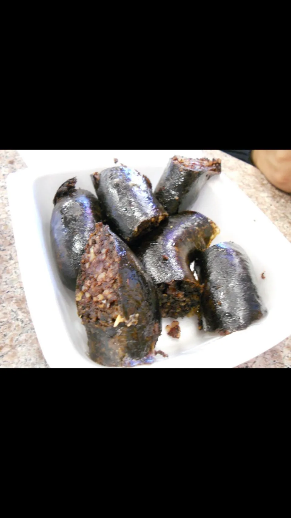 Blood Sausage  from Puerto Rico made with  spices and rice|Frank Ortizさん